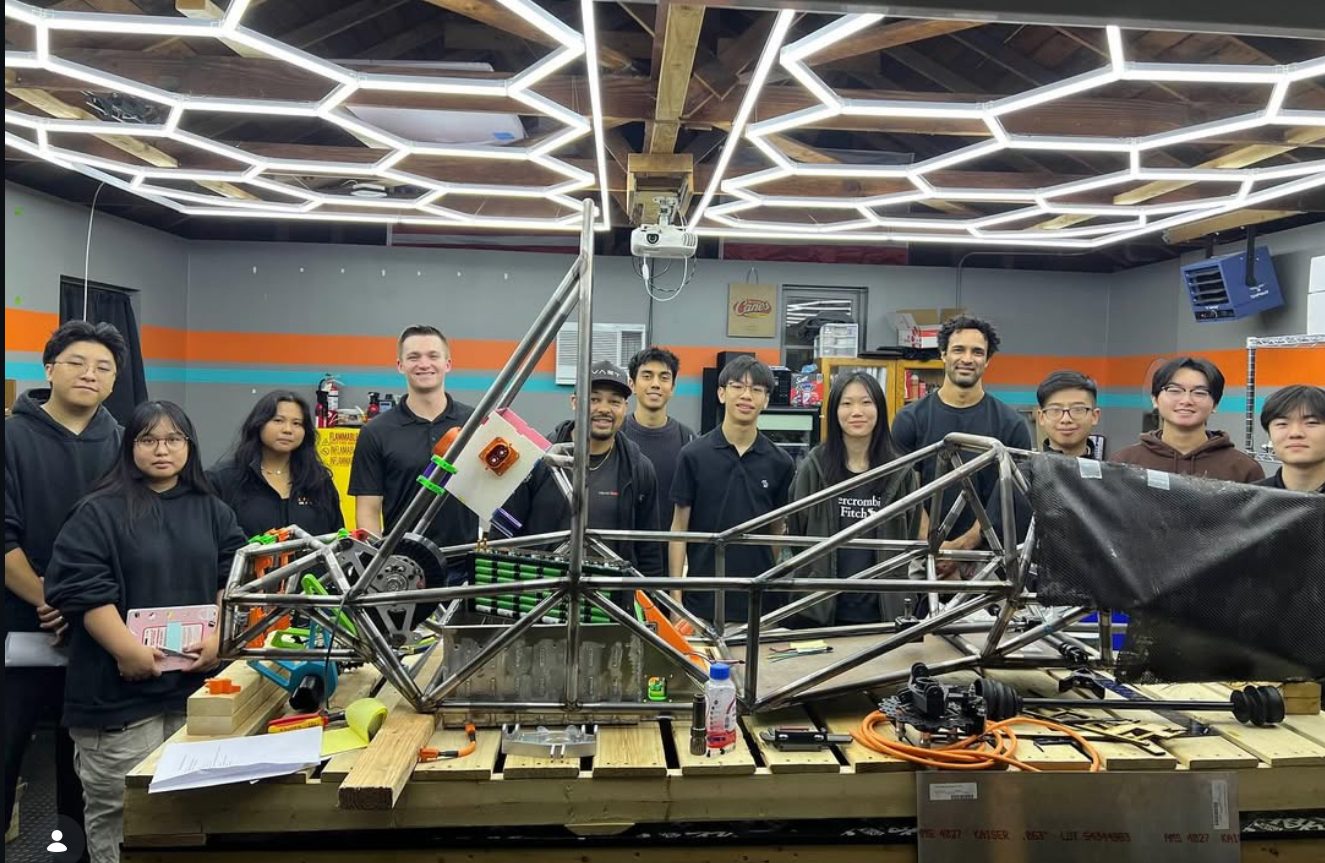 Caltech Racing team with the chassis