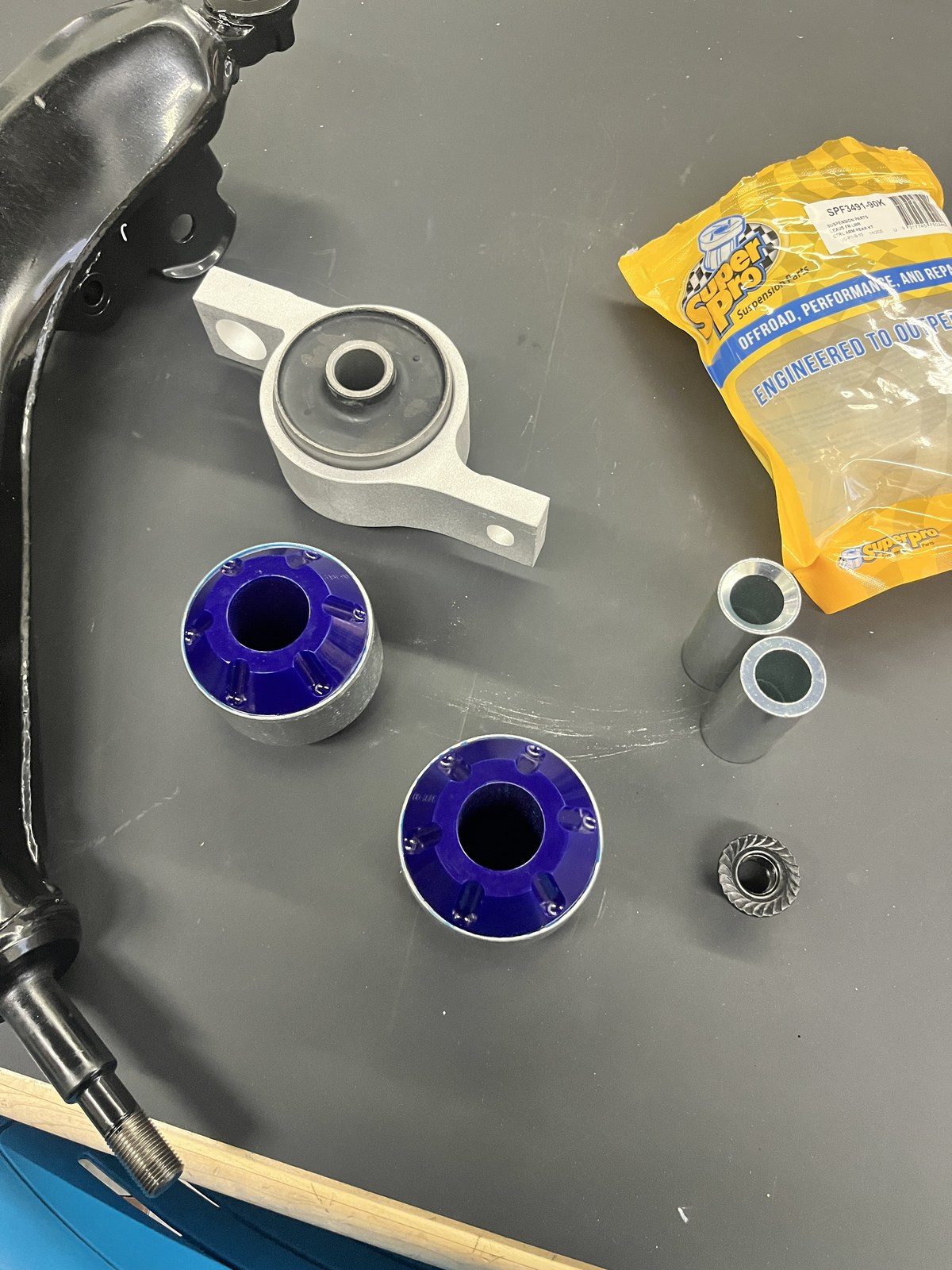 SuperPro bushings next to the lower control arm